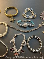 MaxSold Auction: Vintage Costume Jewelry, Bracelets, Brooches, Earrings - Coquitlam (British Columbia, Canada) SELLER MANAGED Downsizing Online Auction - Delestre Avenue