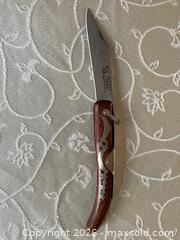 MaxSold Auction: Okapi South Africa Big Sable Folding Knife with a Cherry Wood Handle with Sheath. - Mississauga (Ontario, Canada) SELLER MANAGED Estate Sale Online Auction - Greenbower Court
