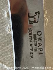 MaxSold Auction: Okapi South Africa Big Sable Folding Knife with a Cherry Wood Handle with Sheath. - Mississauga (Ontario, Canada) SELLER MANAGED Estate Sale Online Auction - Greenbower Court