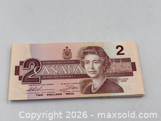 MaxSold Auction: 43 Largely Consecutive Serial Number Two Dollar Canadian Bank Notes. 1986 - Oakville (Ontario, Canada) PARTNER MANAGED Estate Sale Online Auction - Lakeshore Road West