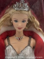 MaxSold Auction: 4 Holiday Babies: Holiday Celebration Barbie / 1997 Mattel Special Edition Festive Season Barbie doll / Holiday Joy Barbie / 2005 Holiday Angel Barbie - Oakville (Ontario, Canada) PARTNER MANAGED Estate Sale Online Auction - Lakeshore Road West