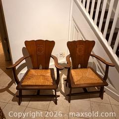 MaxSold Auction: Pair of Antique Dutch Arts and Crafts Oak Armchairs with Rush Seats and Carved Heraldic Crests - Oakville (Ontario, Canada) PARTNER MANAGED Estate Sale Online Auction - Lakeshore Road West