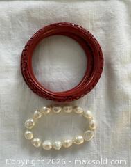 MaxSold Auction:  Pair of Carved Lacquer Cinnabar Bangels and Pearl Bracelet - Oakville (Ontario, Canada) PARTNER MANAGED Estate Sale Online Auction - Lakeshore Road West