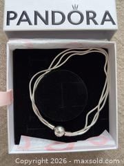 MaxSold Auction:  Two Authentic Pandora Bracelets: Silver and Rose Gold   - Oakville (Ontario, Canada) PARTNER MANAGED Estate Sale Online Auction - Lakeshore Road West