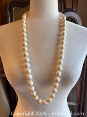 MaxSold Auction: Long Bakelite Beaded Necklace. Hand knotted. Measures: 16 inches long - Oakville (Ontario, Canada) PARTNER MANAGED Estate Sale Online Auction - Lakeshore Road West