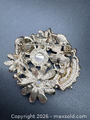 MaxSold Auction: Diorette enamel brooch/pendant - Markham (Ontario, Canada) SELLER MANAGED Downsizing Online Auction - Loring Crescent