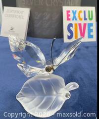 MaxSold Auction: Swarovski butterfly on leaf with box & papers  - Markham (Ontario, Canada) SELLER MANAGED Downsizing Online Auction - Loring Crescent