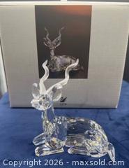 MaxSold Auction: Swarovski Kudu crystal figurine in box  - Markham (Ontario, Canada) SELLER MANAGED Downsizing Online Auction - Loring Crescent
