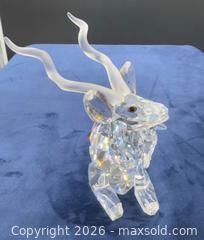 MaxSold Auction: Swarovski Kudu crystal figurine in box  - Markham (Ontario, Canada) SELLER MANAGED Downsizing Online Auction - Loring Crescent