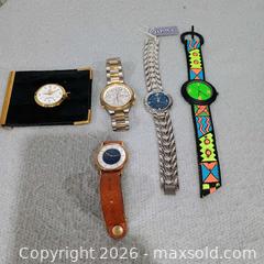 MaxSold Auction: Misc watch lot 5 4 watches and one walletr watch  - Waterford (New Jersey, USA) SELLER MANAGED Downsizing Online Auction - Chew Road