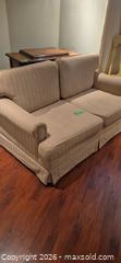 MaxSold Auction: Beige Two-Seat Loveseat with Subtle Vertical Stripe - Toronto (Ontario, Canada) PARTNER MANAGED Downsizing Online Auction - Dawlish Avenue