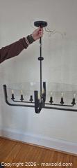 MaxSold Auction: Eurofase 8-Light Pendant Chandelier in Matte Black/Oil?Rubbed Bronze - Toronto (Ontario, Canada) PARTNER MANAGED Downsizing Online Auction - Dawlish Avenue