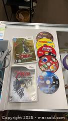 MaxSold Auction: Lot of Wii console, controllers, & games - Dundee Township (Illinois, USA) PARTNER MANAGED Reseller Online Auction - Airport Road