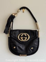 MaxSold Auction: Vintage Gucci Britt Tassel Shoulder Bag in Black Leather with Gold Tone Hardware - Toronto (Ontario, Canada) PARTNER MANAGED Estate Sale Online Auction - Margueretta Street