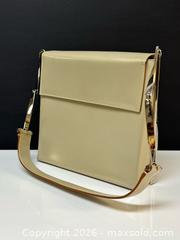 MaxSold Auction: Vintage Salvatore Ferragamo Women’s Leather Handbag with Chrome Metal Strap - Toronto (Ontario, Canada) PARTNER MANAGED Estate Sale Online Auction - Edmond Avenue