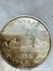 MaxSold Auction: 1953 Canadian $1 Silver Dollar - Elizabeth II Voyageur  - Toronto (Ontario, Canada) SELLER MANAGED Estate Sale Online Auction -Wellesley Street East