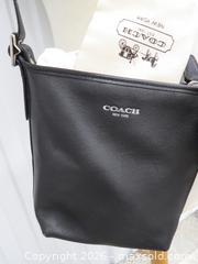 MaxSold Auction: Coach Black Leather Crossbody/Shoulder Bag with Fur Pom - Toronto (Ontario, Canada) PARTNER MANAGED Downsizing Online Auction - Research Road (STORAGE)