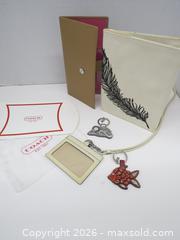 MaxSold Auction: Coach Multi-Item Travel Wallet with Charms & Crossbody Strap - Toronto (Ontario, Canada) PARTNER MANAGED Downsizing Online Auction - Research Road (STORAGE)