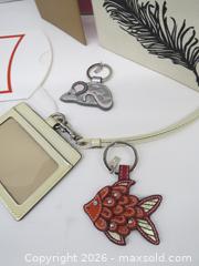 MaxSold Auction: Coach Multi-Item Travel Wallet with Charms & Crossbody Strap - Toronto (Ontario, Canada) PARTNER MANAGED Downsizing Online Auction - Research Road (STORAGE)