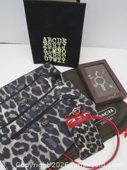 MaxSold Auction: Coach, Papyrus & Indigo lot: Leopard Print Lanyard, Keychain, Slipcover - Toronto (Ontario, Canada) PARTNER MANAGED Downsizing Online Auction - Research Road (STORAGE)
