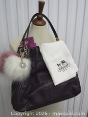 MaxSold Auction: COACH PEBBLED GENUINE LEATHER EGGPLANT BAG - Toronto (Ontario, Canada) PARTNER MANAGED Downsizing Online Auction - Research Road (STORAGE)