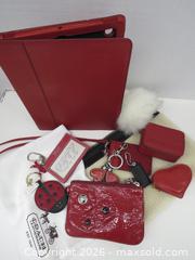 MaxSold Auction: COACH RED LEATHER & SIGNATURE CANVAS FOLIO - Toronto (Ontario, Canada) PARTNER MANAGED Downsizing Online Auction - Research Road (STORAGE)