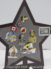 MaxSold Auction: Multicolor Enamel Pin Collection with Perforated Star Display - Toronto (Ontario, Canada) PARTNER MANAGED Downsizing Online Auction - Research Road (STORAGE)