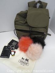 MaxSold Auction: Olive & Black Nylon Backpack with Orange Interior DEREK ALEXANDER - Toronto (Ontario, Canada) PARTNER MANAGED Downsizing Online Auction - Research Road (STORAGE)