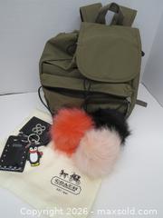 MaxSold Auction: Olive & Black Nylon Backpack with Orange Interior DEREK ALEXANDER - Toronto (Ontario, Canada) PARTNER MANAGED Downsizing Online Auction - Research Road (STORAGE)