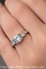 MaxSold Auction: Elegant Three-Stone Engagement Ring — Timeless Sophistication  - Newmarket (Ontario, Canada) SELLER MANAGED Downsizing Online Auction -  Brimson Drive (STORAGE)