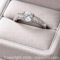 MaxSold Auction: Elegant Three-Stone Engagement Ring — Timeless Sophistication  - Newmarket (Ontario, Canada) SELLER MANAGED Downsizing Online Auction -  Brimson Drive (STORAGE)