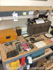 MaxSold Auction: Metal Frame Workbench with Plywood Shelves, 3 Tiers + Top - Glendale (California, USA) PARTNER MANAGED Downsizing Online Auction - Raymond Avenue