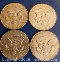 MaxSold Auction: Four JFK silver half dollars - Gloucester (Massachusetts, USA) SELLER MANAGED Downsizing Online Auction - Kondelin Road