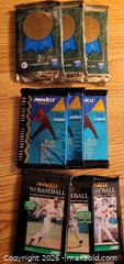 MaxSold Auction: Nine foil packs of 1990s baseball cards - Gloucester (Massachusetts, USA) SELLER MANAGED Downsizing Online Auction - Kondelin Road