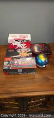 MaxSold Auction: Five empty Pokémon containers - Ottawa (Ontario, Canada) SELLER MANAGED Downsizing Online Auction - Seabrooke Drive