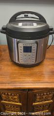 MaxSold Auction:  This is an Instant Pot Duo Plus 9-in-1 electric pressure cooker.  - Ottawa (Ontario, Canada) SELLER MANAGED Downsizing Online Auction - Seabrooke Drive