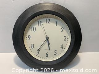 MaxSold Auction: Black Solid Wood Wall Clock with Quartz Movement - New Westminster (British Columbia, Canada) SELLER MANAGED Reseller Online Auction - Canfor Avenue