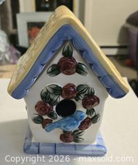 MaxSold Auction: White Ceramic Birdhouse Candle with Blue Trim and Floral Motif - New Westminster (British Columbia, Canada) SELLER MANAGED Reseller Online Auction - Canfor Avenue