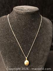 MaxSold Auction: 14 KT Gold Filled Locket and Chain - Saanich (British Columbia, Canada) SELLER MANAGED Downsizing Online Auction - Colquitz Avenue