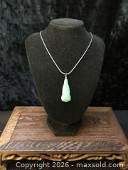 MaxSold Auction: Burmese Jade Buddha Pendant - Saanich (British Columbia, Canada) SELLER MANAGED Downsizing Online Auction - Colquitz Avenue