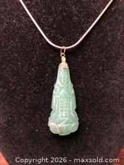 MaxSold Auction: Burmese Jade Buddha Pendant - Saanich (British Columbia, Canada) SELLER MANAGED Downsizing Online Auction - Colquitz Avenue