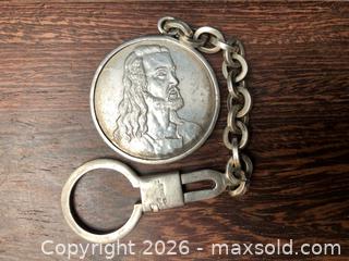 MaxSold Auction: Silver Jesus Medal Key Chain - Saanich (British Columbia, Canada) SELLER MANAGED Downsizing Online Auction - Colquitz Avenue