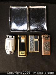 MaxSold Auction: Vintage Lighters and Chrome Case - Saanich (British Columbia, Canada) SELLER MANAGED Downsizing Online Auction - Colquitz Avenue