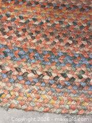 MaxSold Auction: Braided Oval Area Rug, Multicolor Earth Tones, Est. 5'x8'-6'x9' - Kingston (Ontario, Canada) SELLER MANAGED Downsizing Online Auction - Langfield Street