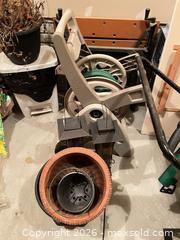 MaxSold Auction: Lot: Hose Reel, Garden Pots, Bird Feeders, Workbench Panels - Kingston (Ontario, Canada) SELLER MANAGED Downsizing Online Auction - Langfield Street
