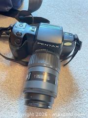 MaxSold Auction: Pentax film SLR with tele zoom lens & Sony Cyber-shot DSC-P32 - Kingston (Ontario, Canada) SELLER MANAGED Downsizing Online Auction - Langfield Street
