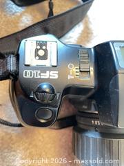 MaxSold Auction: Pentax film SLR with tele zoom lens & Sony Cyber-shot DSC-P32 - Kingston (Ontario, Canada) SELLER MANAGED Downsizing Online Auction - Langfield Street