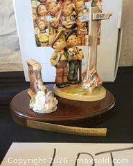 MaxSold Auction: M.I. Hummel Porcelain Figurine Display on Wood Base - San Jose (California, USA) PARTNER MANAGED Estate Sale Online Auction - Dunn Ave