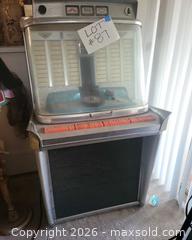 MaxSold Auction: Vintage floor-standing jukebox (record/selector style) — 120 song - San Jose (California, USA) PARTNER MANAGED Estate Sale Online Auction - Dunn Ave