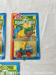 MaxSold Auction: Five vintage 1980s Sesame Street toys in original packaging - Vallejo (California, USA) SELLER MANAGED Estate Sale Online Auction - Georgia Street